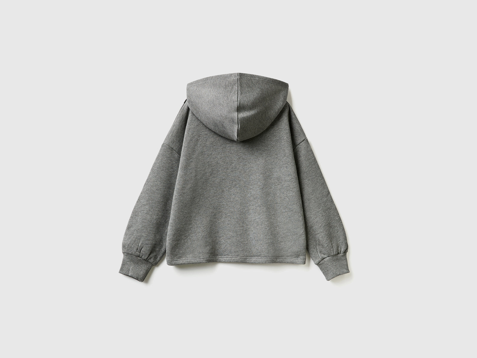 Felpa over fit con cappuccio da bambina grigio scuro 2 | Benetton Outlet