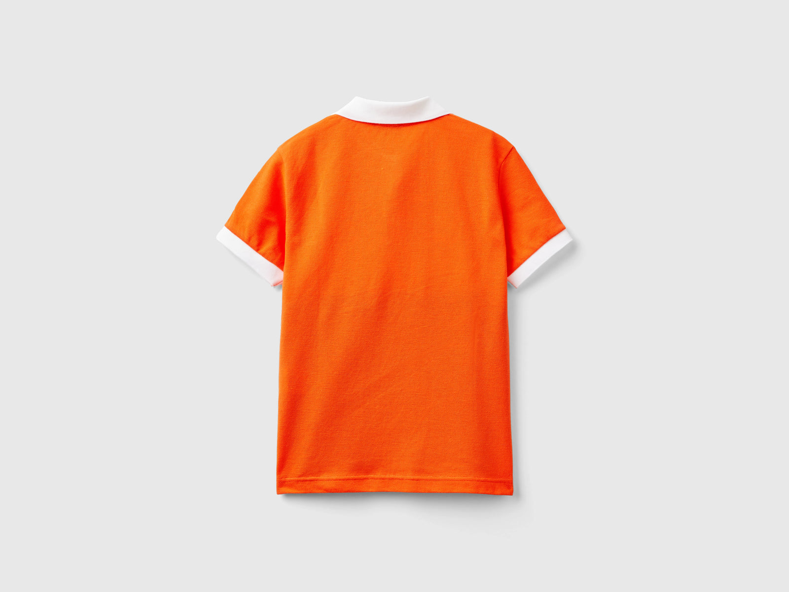 Polo color block in cotone bio da bambino arancione 2 | Benetton Outlet