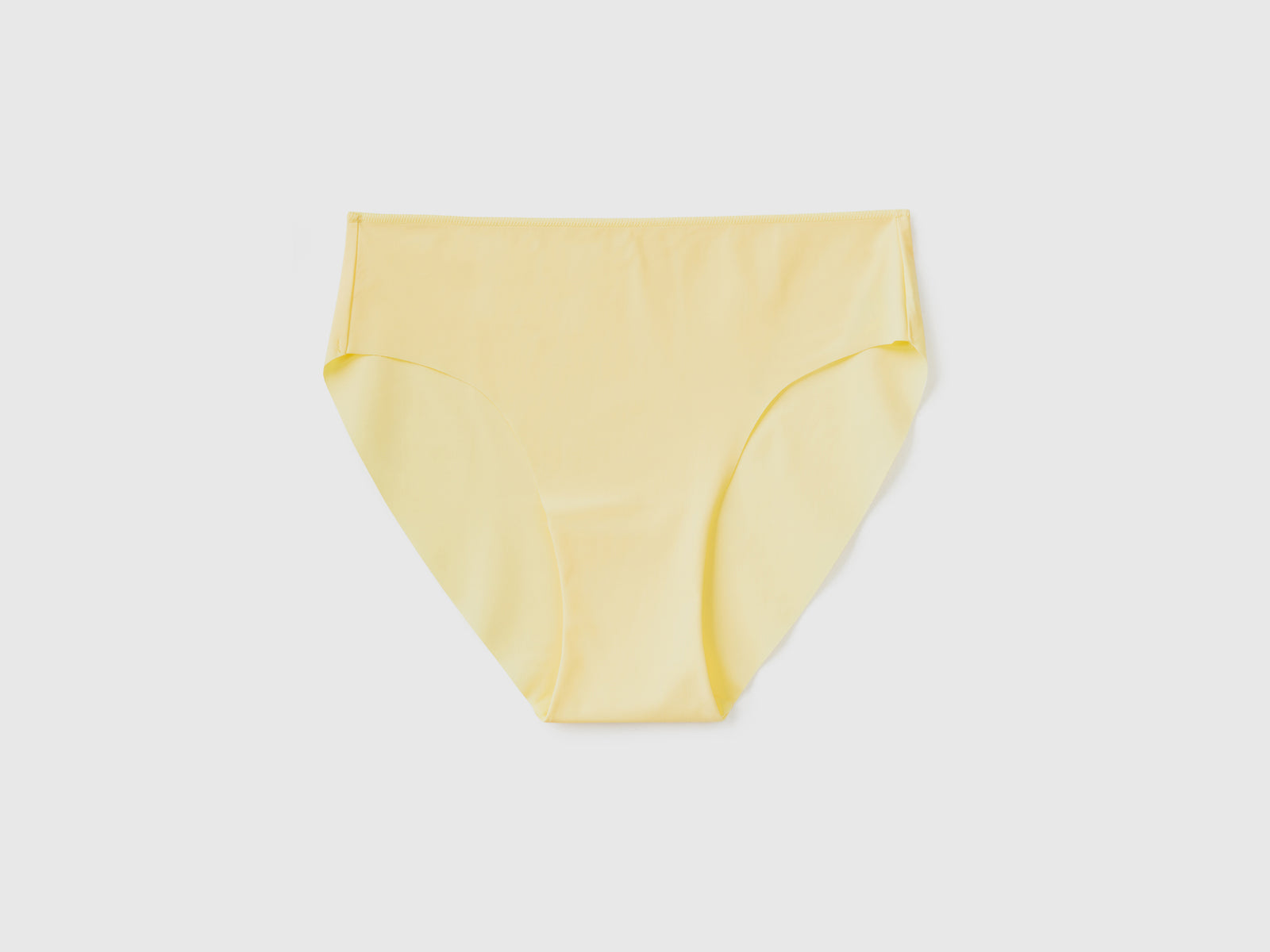 Mutande dal taglio basico in tessuto elasticizzato con bordi a taglio vivo da donna giallo | Benetton Outlet
