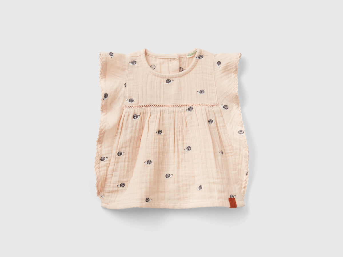 Blusa con volant e ricami