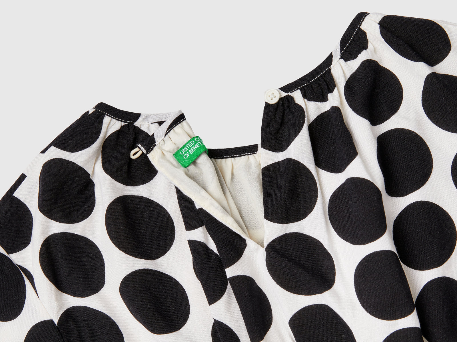 Abito fluido a pois da bambina multi-color 2 | Benetton Outlet