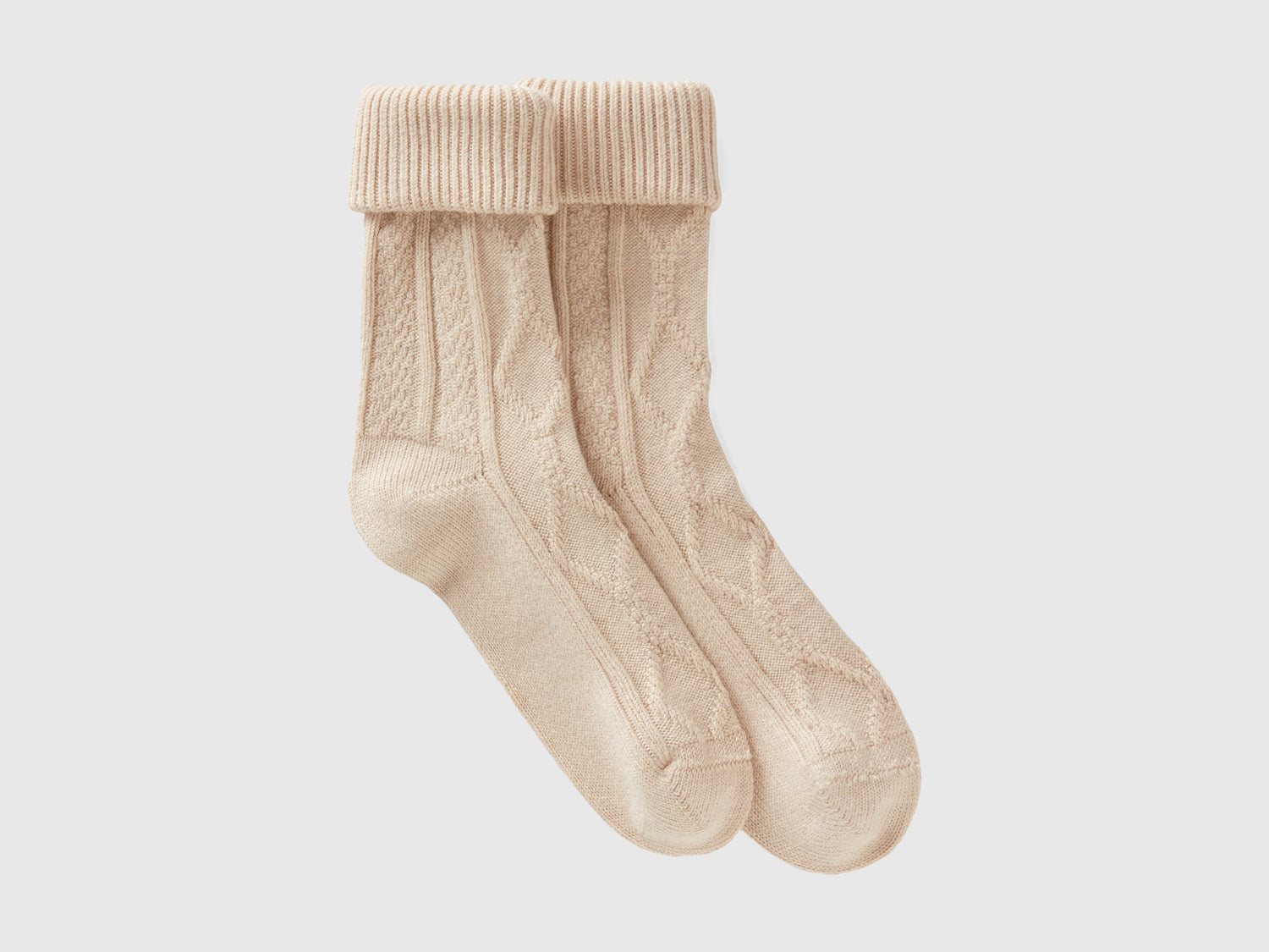 Calzini lunghi jacquard da donna beige | Benetton Outlet