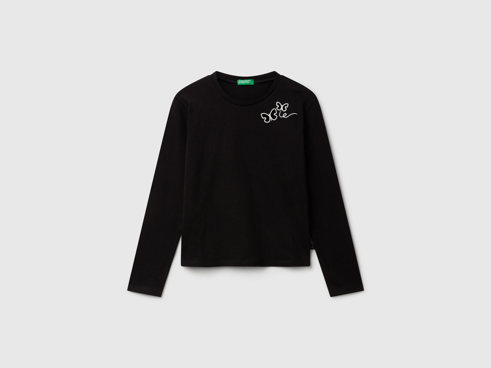 T-shirt con farfalle cut out da bambina nero | Benetton Outlet