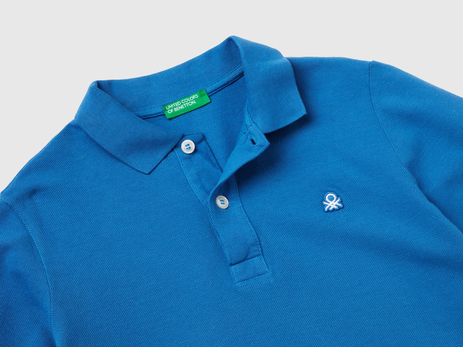 Polo slim fit 100% cotone da bambino blu 2 | Benetton Outlet