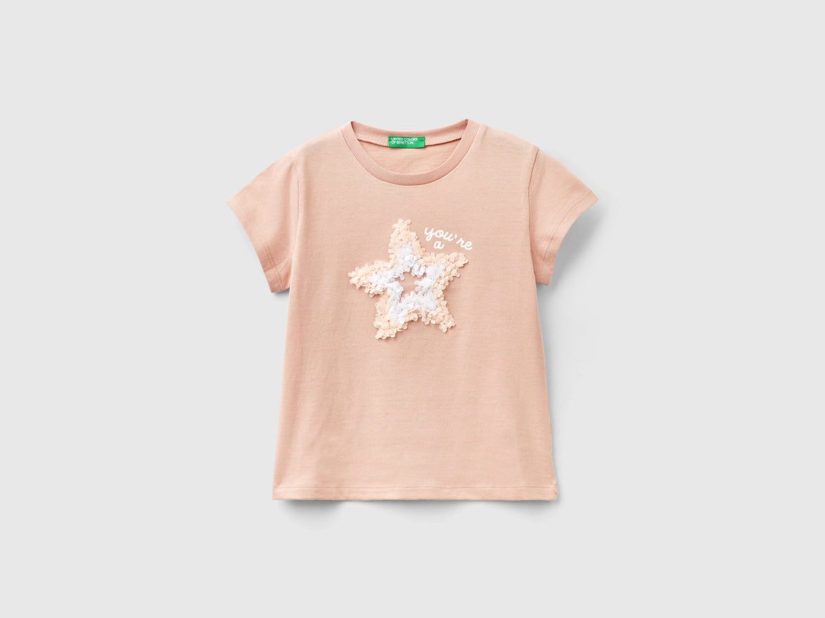 T-shirt con applicazione effetto petali