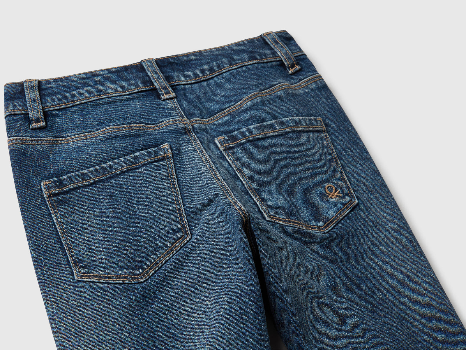 Jeans cinque tasche a zampa da bambina blu 3 | Benetton Outlet