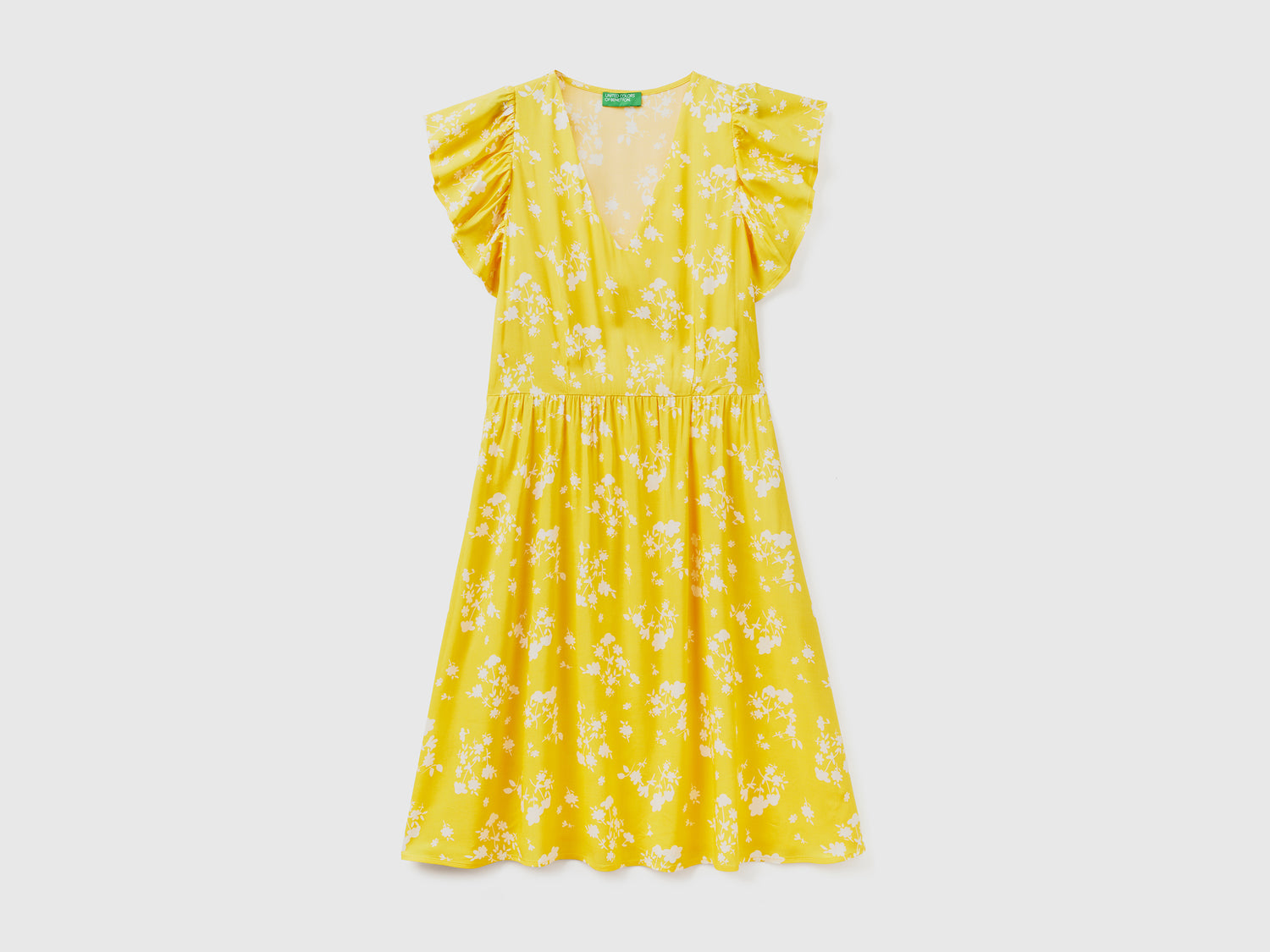 Vestito corto con scollo a V in tessuto fluido e leggero di pura viscosa da donna giallo | Benetton Outlet