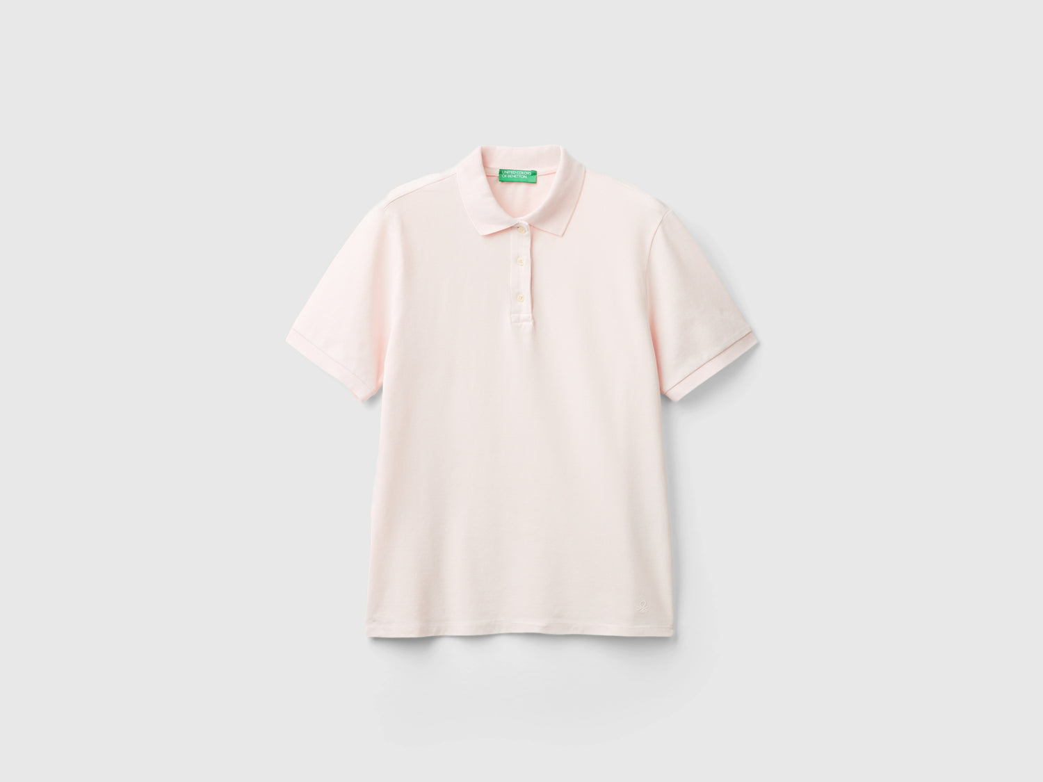 Polo in cotone bio stretch da donna rosa pastello | Benetton Outlet