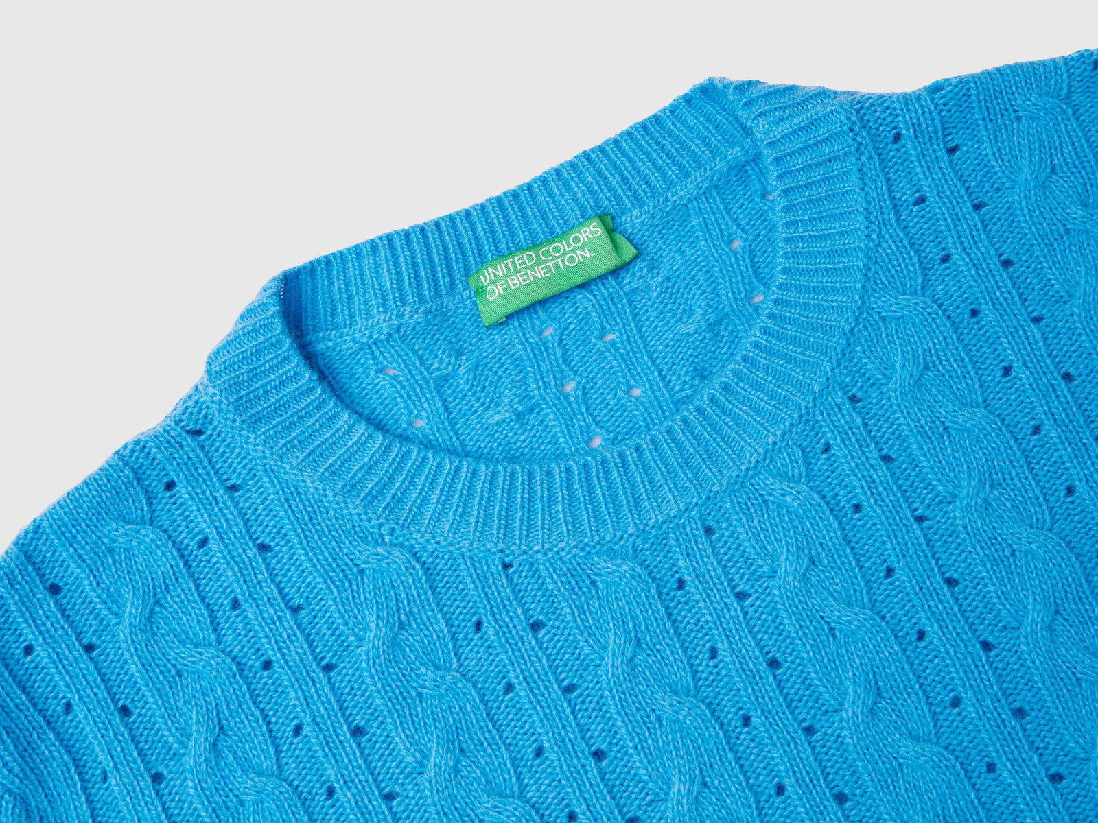 Maglia cropped con trecce e trafori da donna azzurro 3 | Benetton Outlet