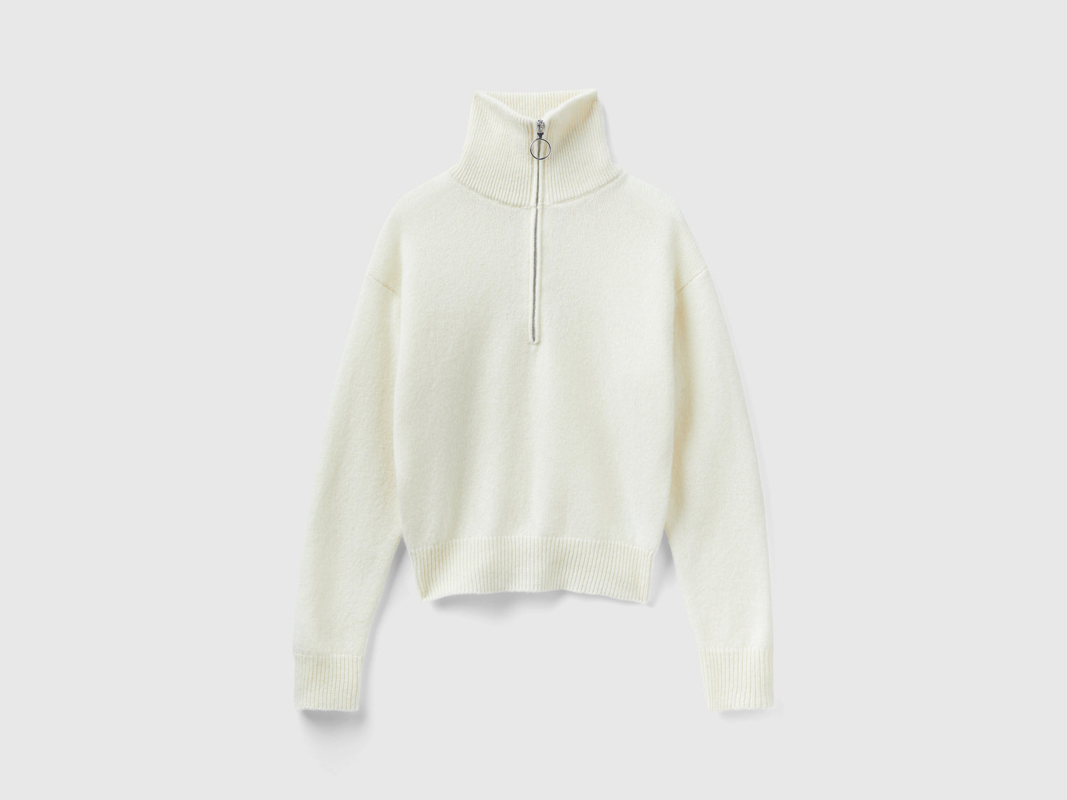 Maglione collo alto in pura lana Shetland da donna bianco panna | Benetton Outlet