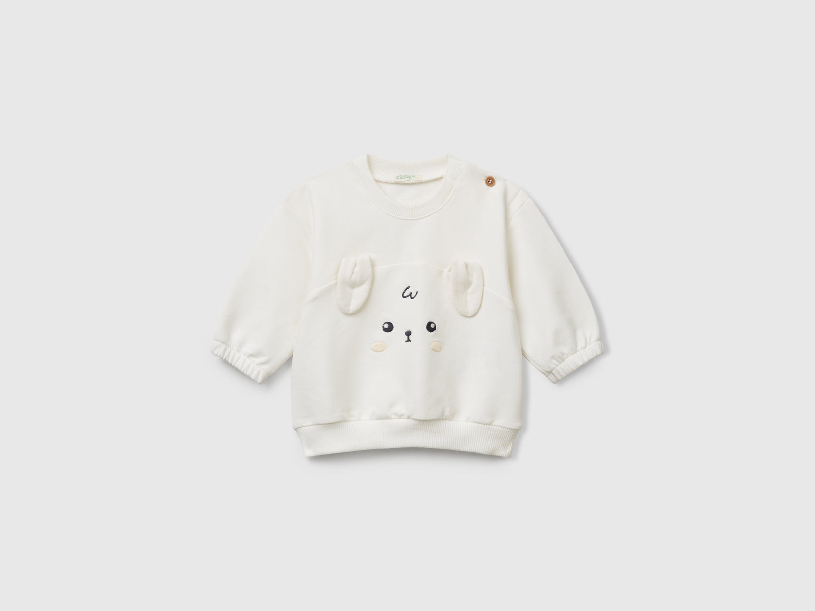 Felpa con ricamo e patch da neonato bianco panna | Benetton Outlet