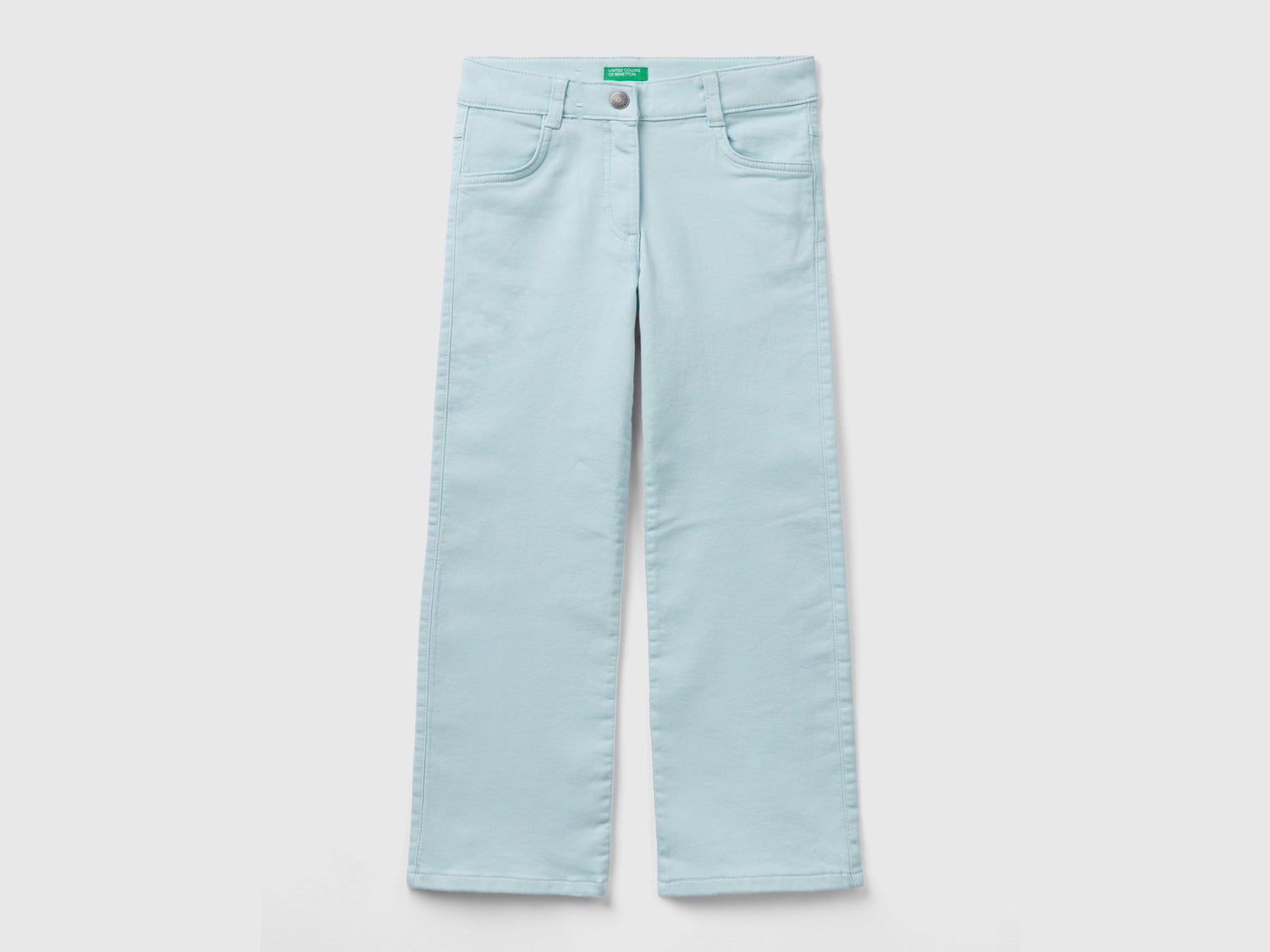 Pantaloni a zampa stretch da bambina azzurro | Benetton Outlet
