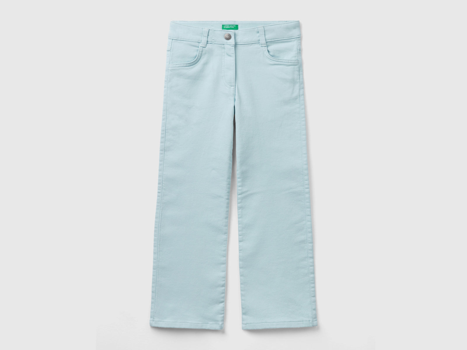 Pantaloni a zampa stretch da bambina azzurro | Benetton Outlet
