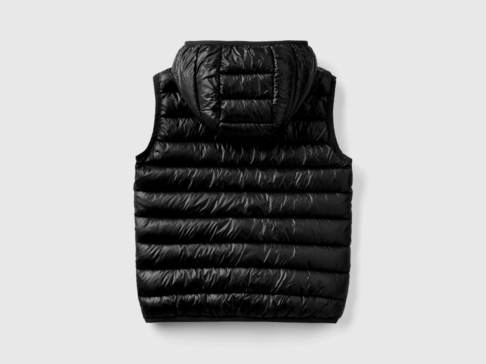 Gilet imbottito con cappuccio da bambina nero 2 | Benetton Outlet
