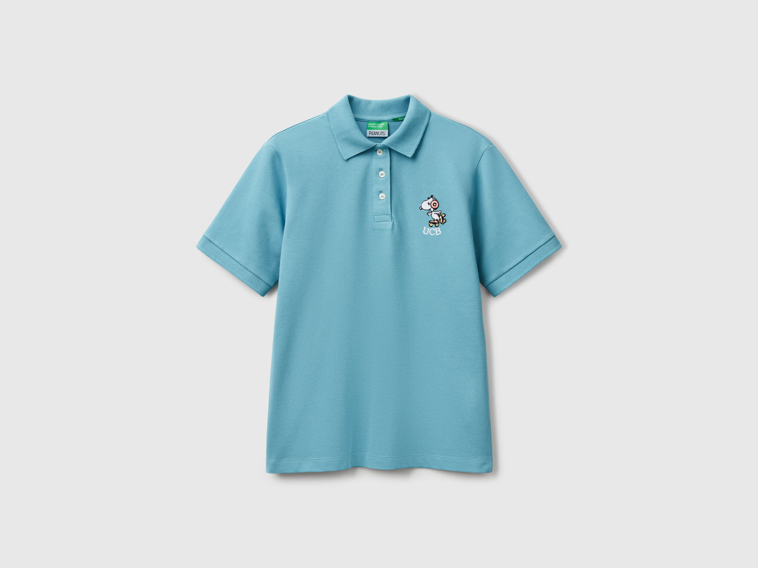 Polo regular fit Snoopy ©Peanuts da donna azzurro | Benetton Outlet