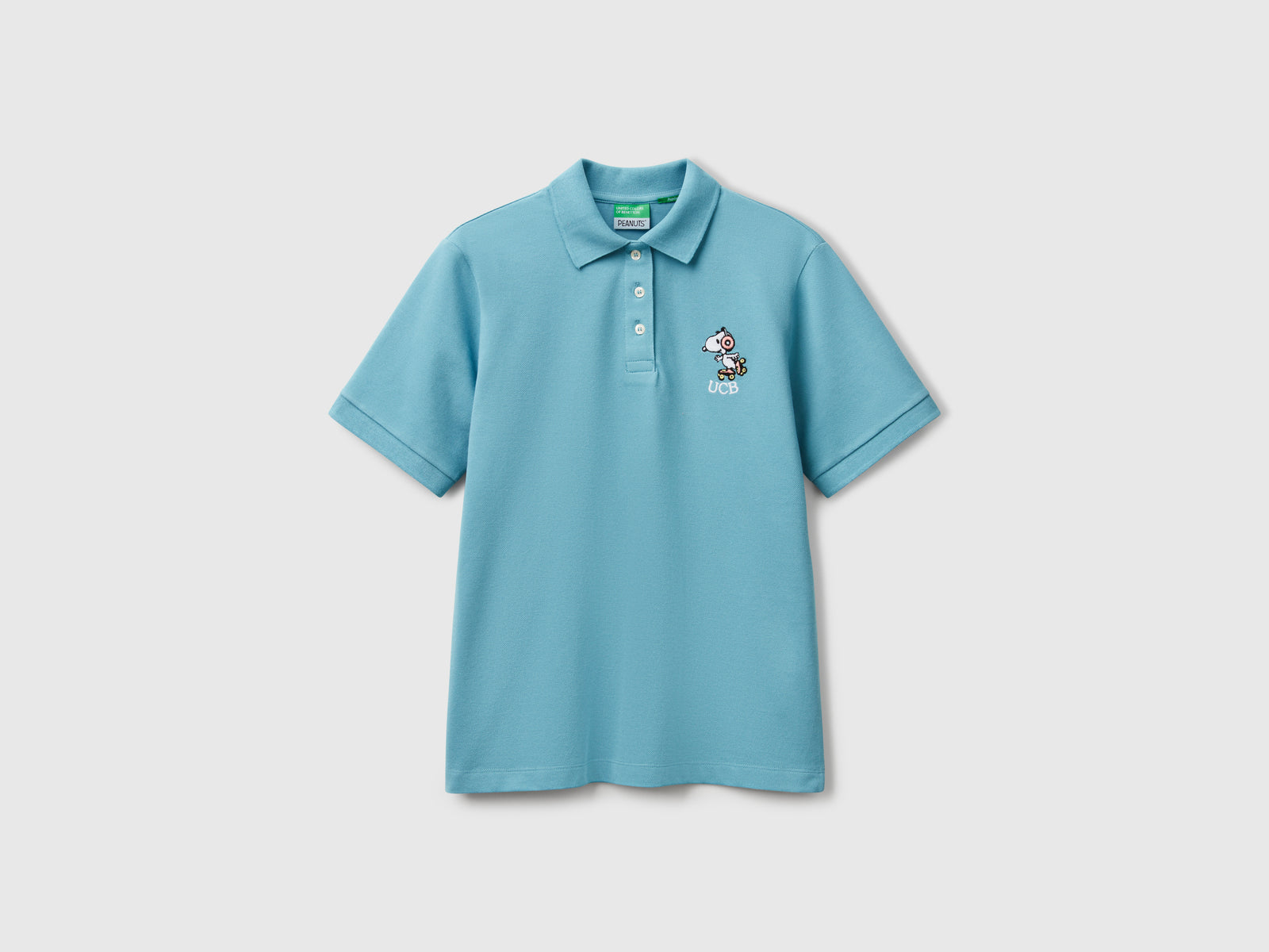 Polo regular fit Snoopy ©Peanuts da donna azzurro | Benetton Outlet