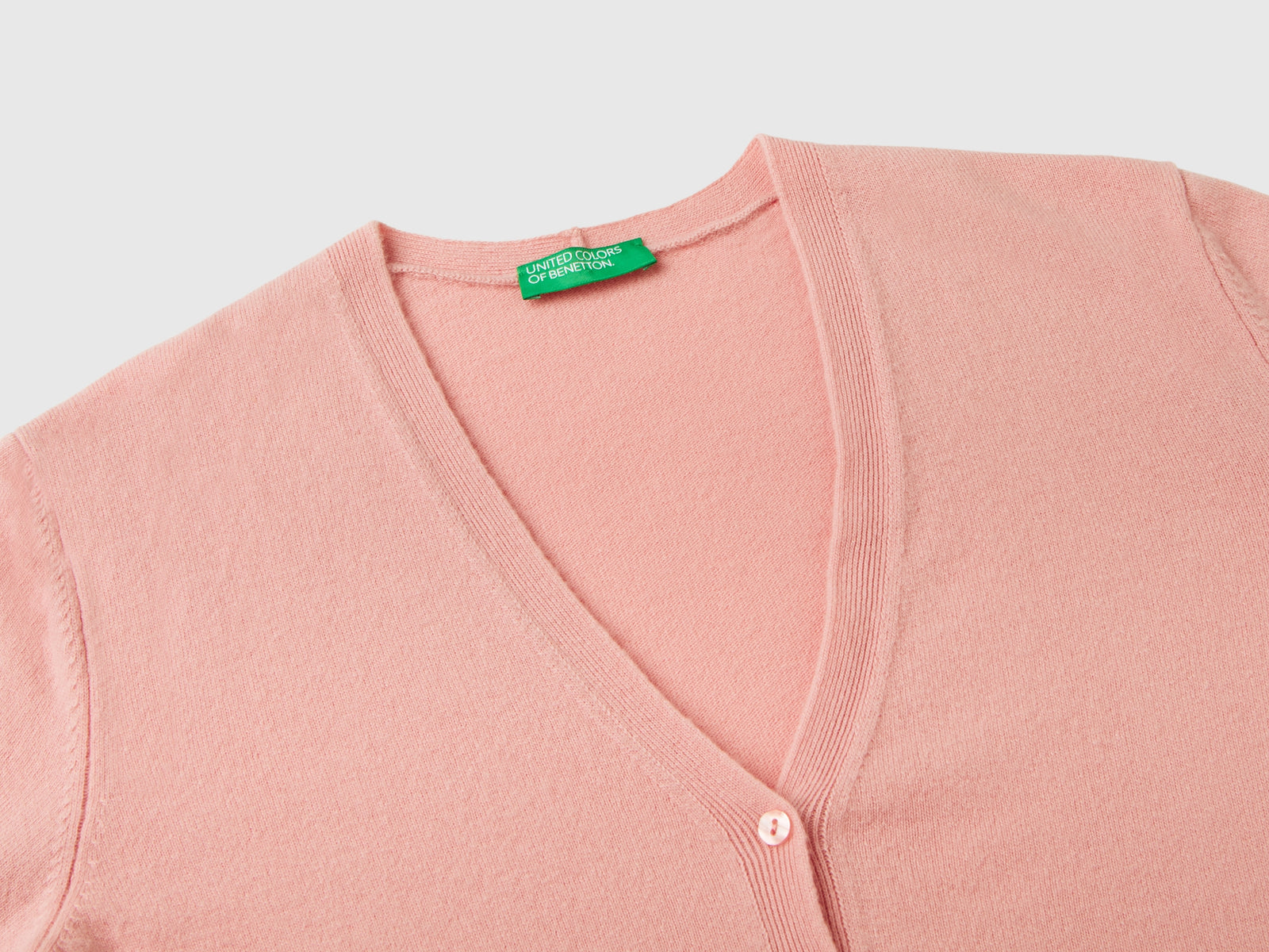 Cardigan scollo a V in pura lana Merino da donna rosa 3 | Benetton Outlet