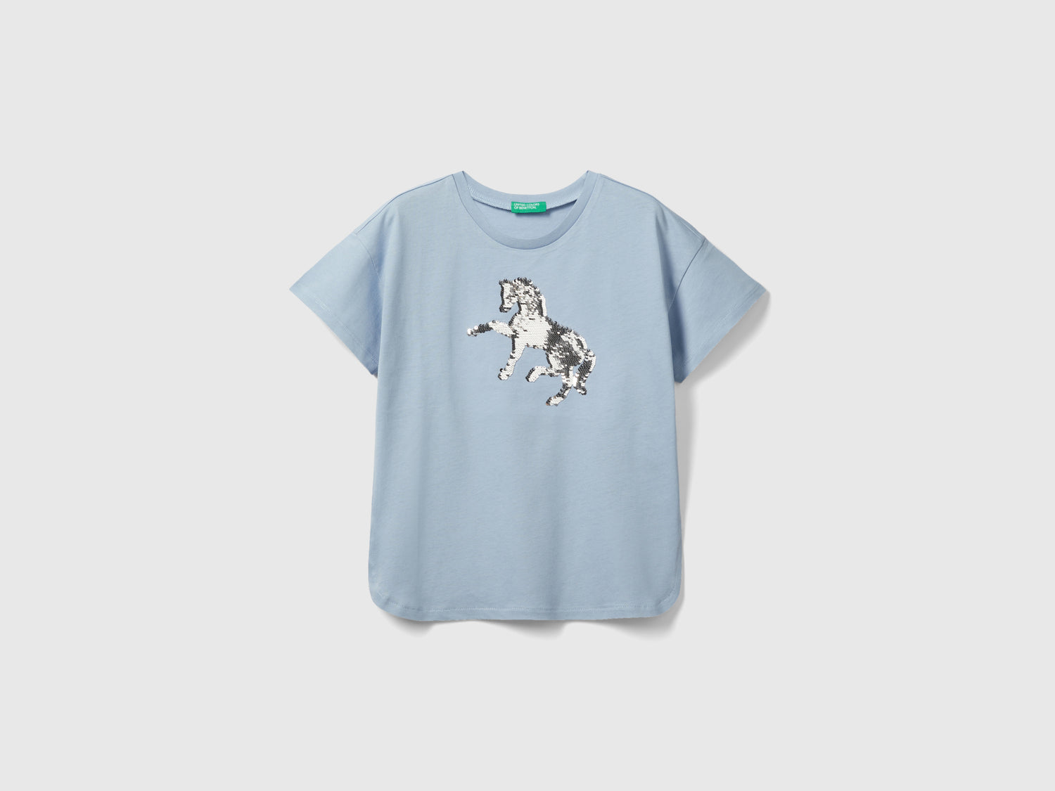 Maglietta con paillettes reversibili da bambina celeste | Benetton Outlet
