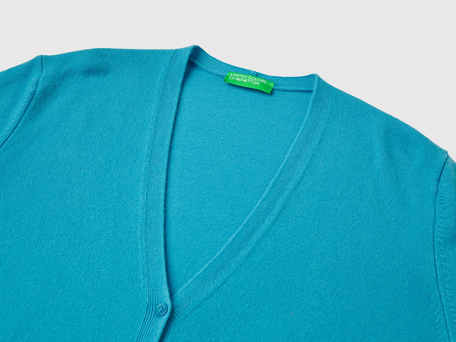 Cardigan scollo a V in pura lana Merino da donna azzurro 3 | Benetton Outlet
