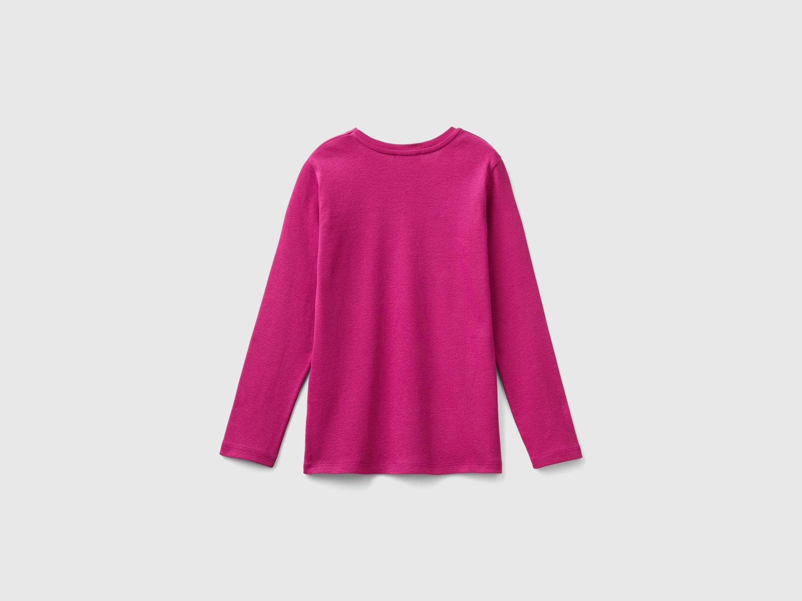 T-shirt manica lunga con stampa glitter da bambina fucsia 2 | Benetton Outlet