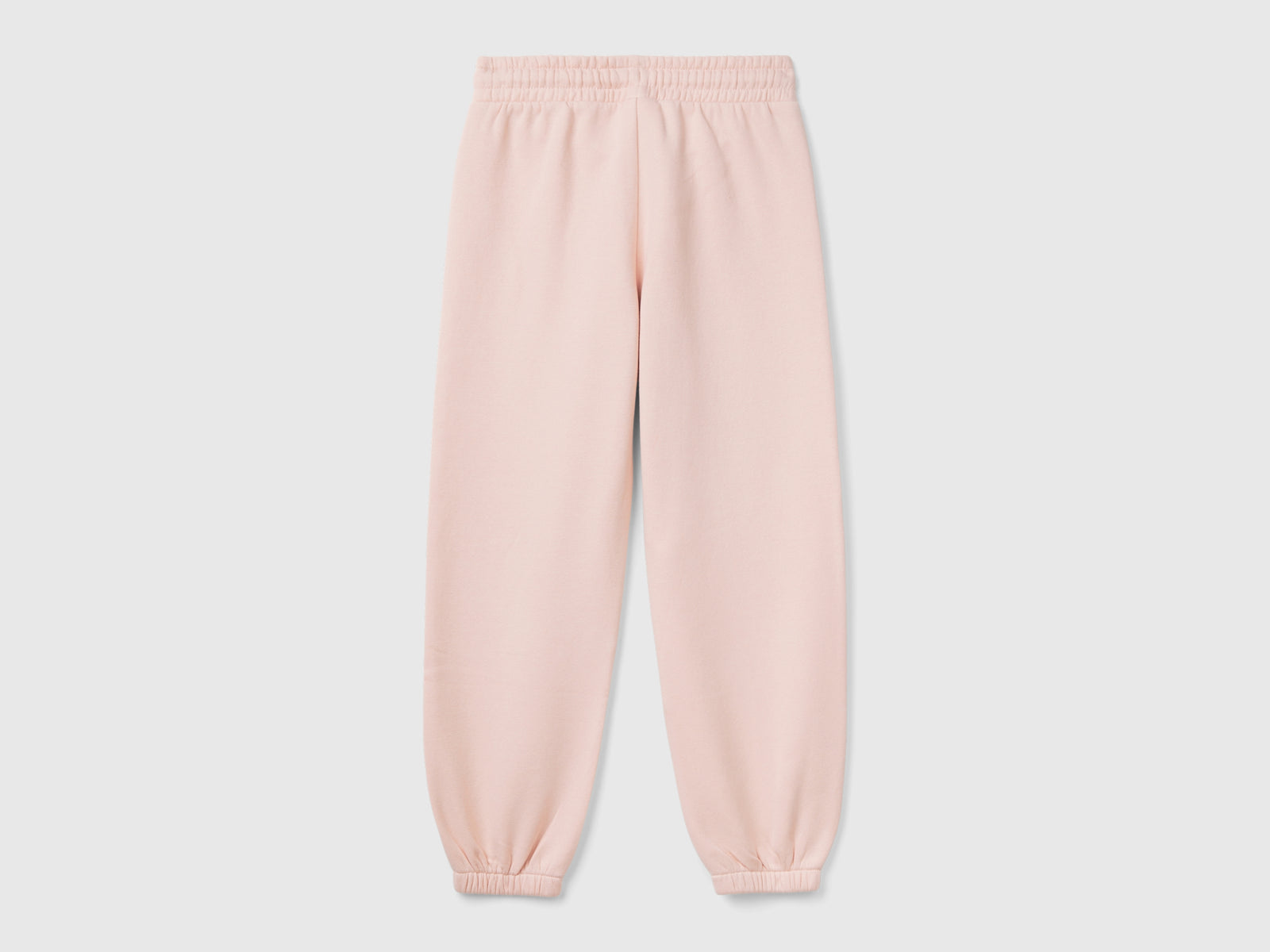 Joggers in felpa con coulisse da bambina rosa tenue 2 | Benetton Outlet