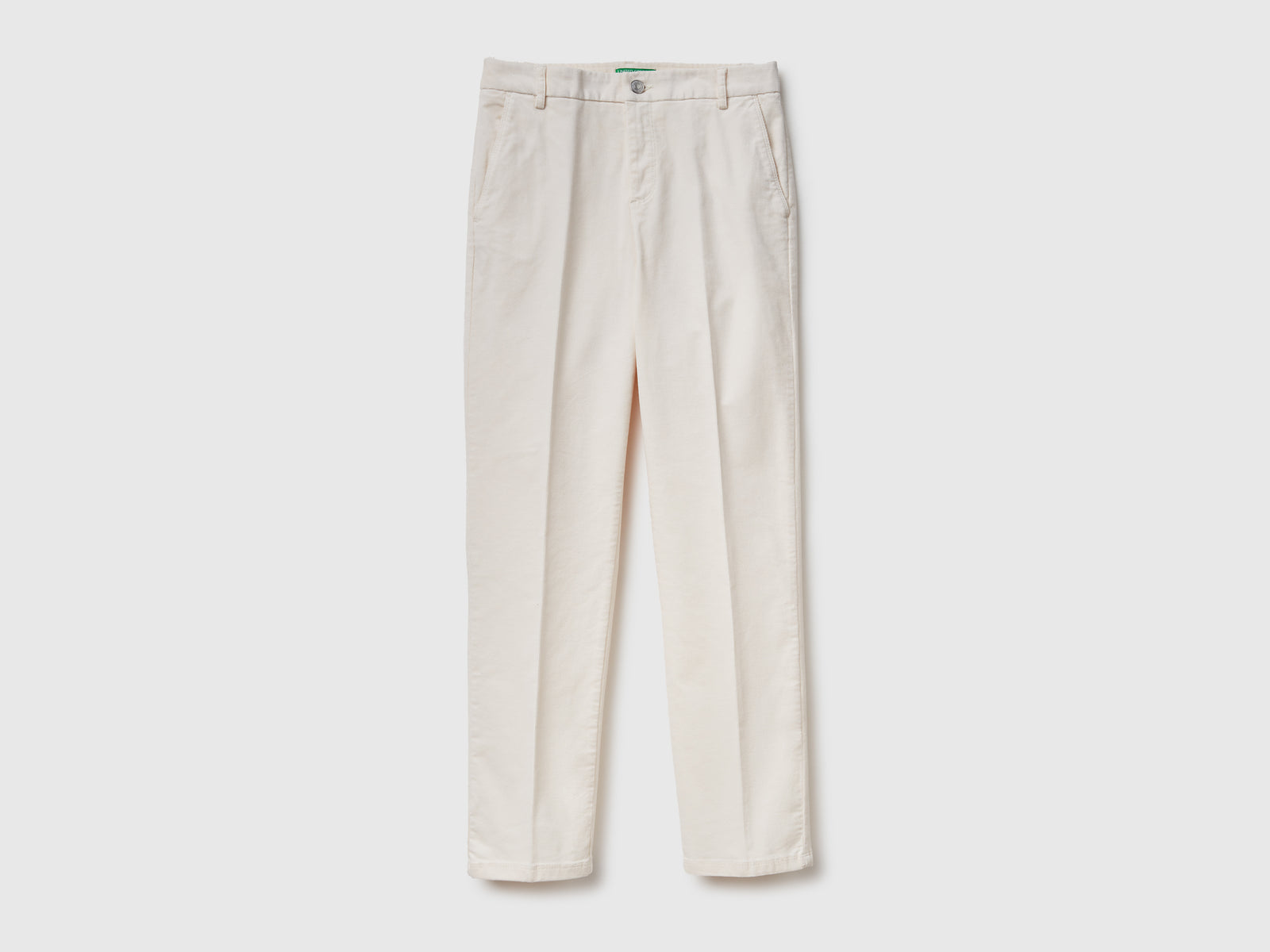 Chino in velluto elasticizzato da donna bianco panna | Benetton Outlet