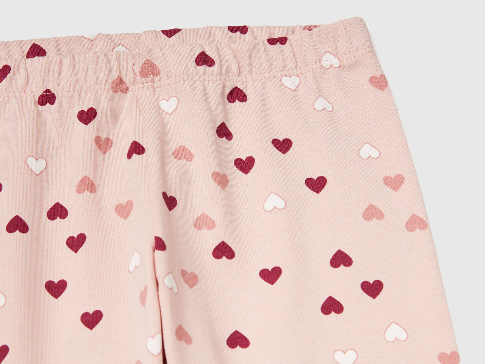 Leggings rosa chiaro a cuori da bimba rosa tenue 3 | Benetton Outlet