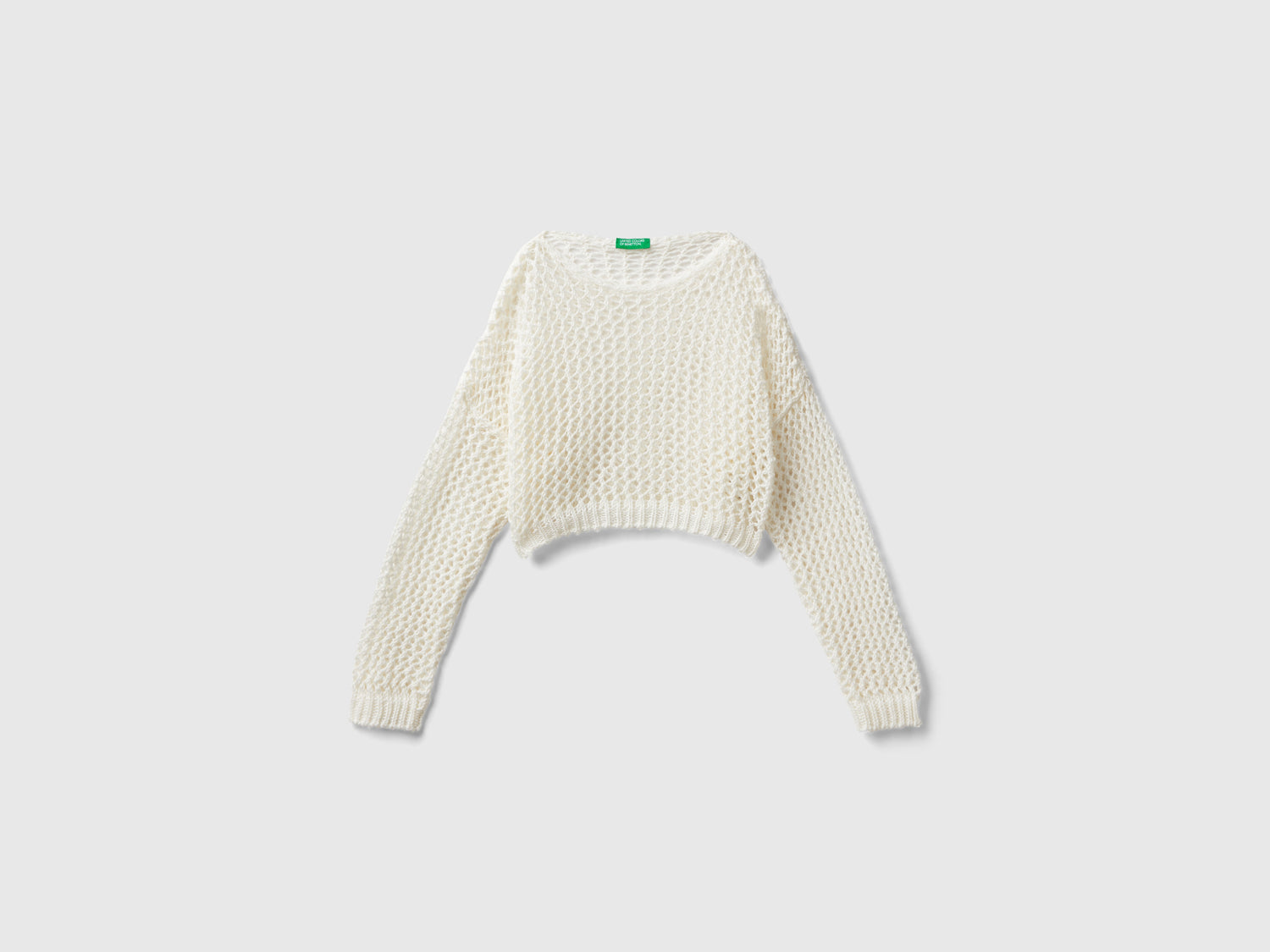 Maglia corta boxy fit da bambina bianco panna | Benetton Outlet