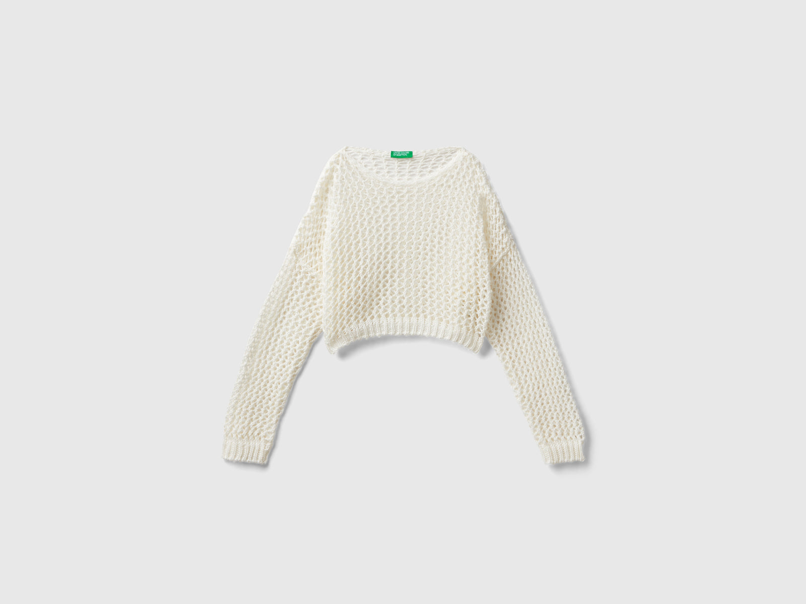 Maglia corta boxy fit da bambina bianco panna | Benetton Outlet