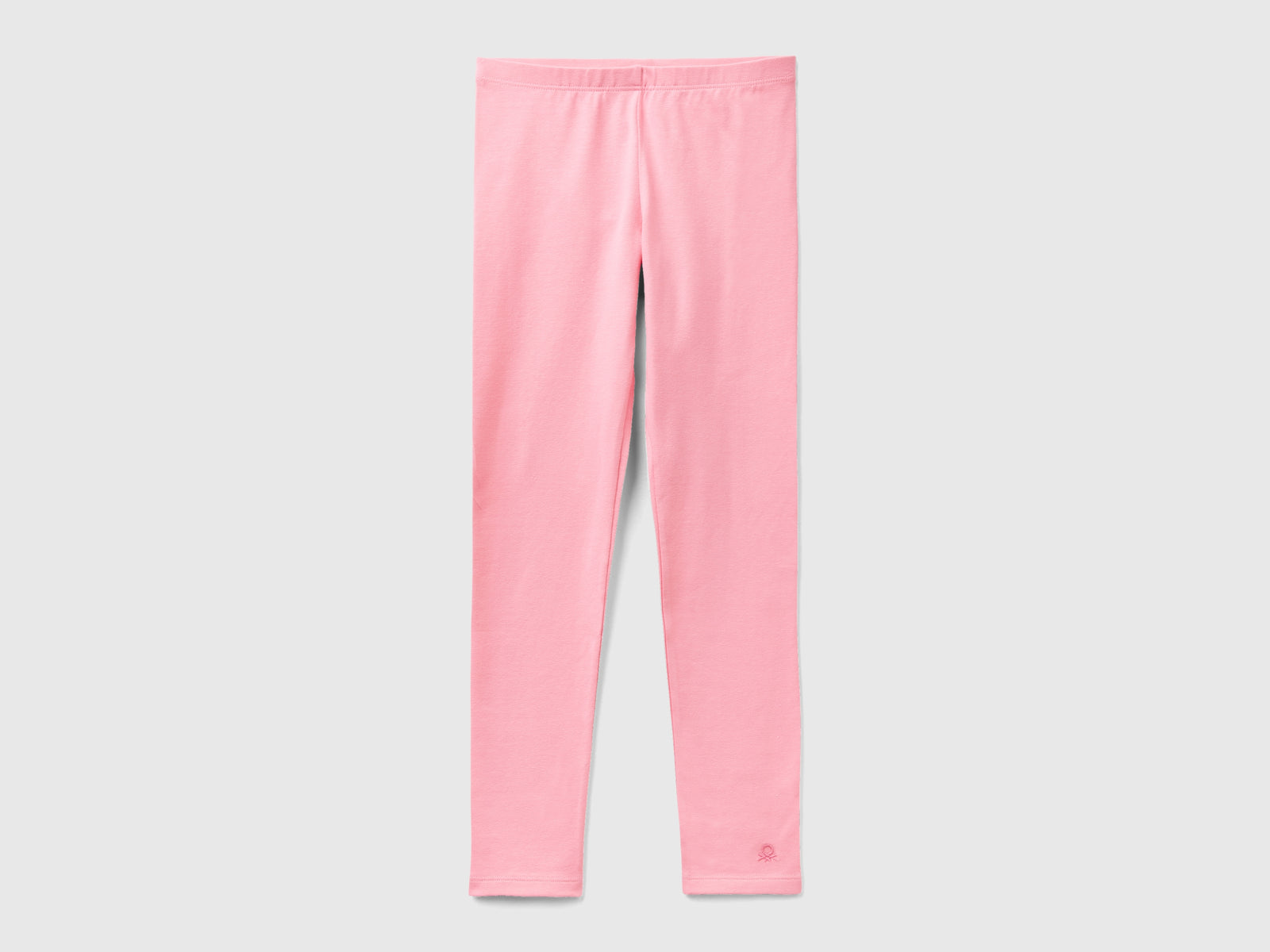 Leggings in cotone stretch con logo da bambina rosa | Benetton Outlet