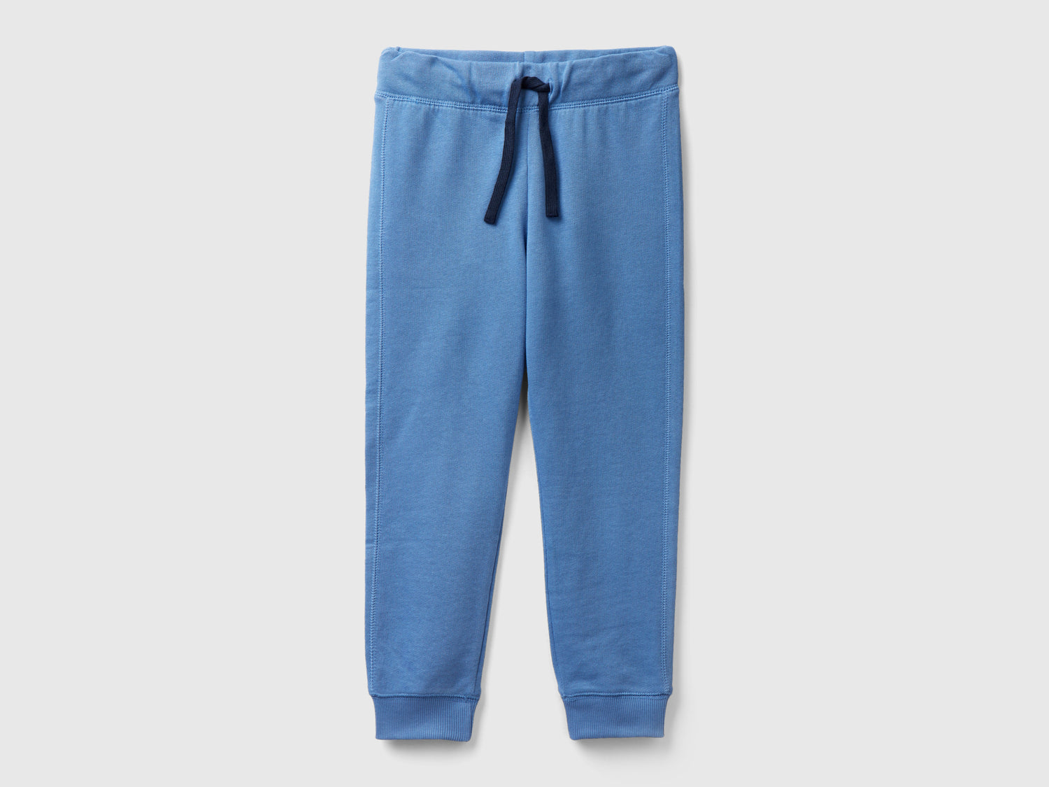 Pantaloni in felpa 100% cotone da bambino azzurro | Benetton Outlet