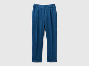 Pantaloni lunghi in puro lino con taglio cropped e gamba affusolata