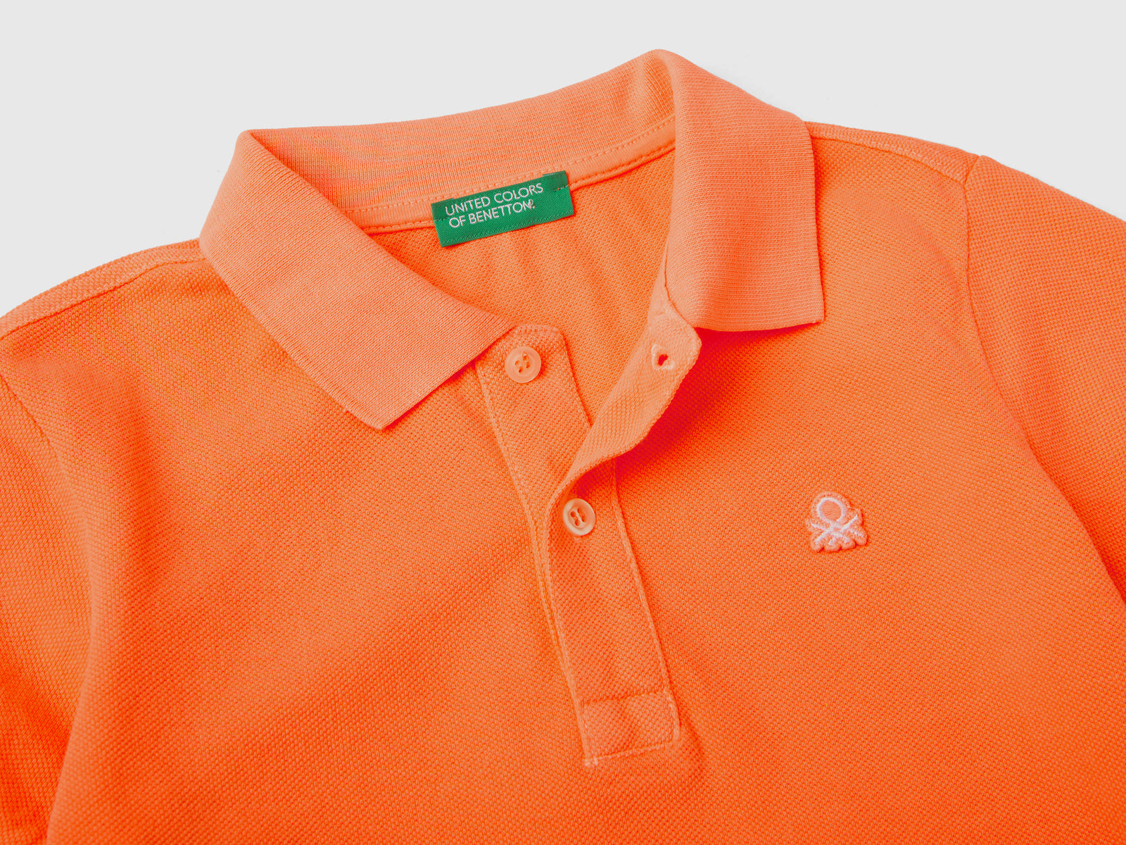 Polo fluo in cotone biologico da bimbo arancione fluo 2 | Benetton Outlet