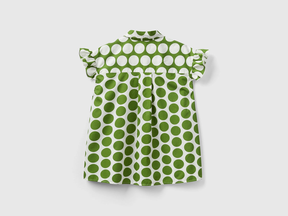Camicia smanicata a pois