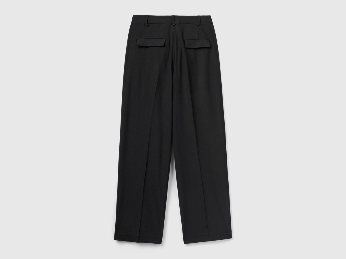 Pantaloni fluidi con doppia piega