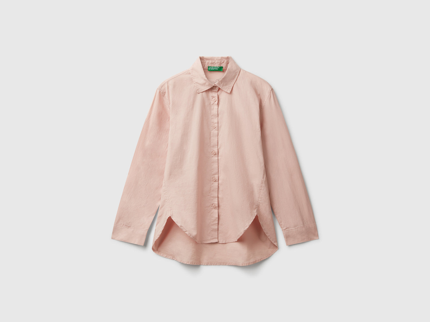 Camicia over fit da bambina rosa tenue | Benetton Outlet