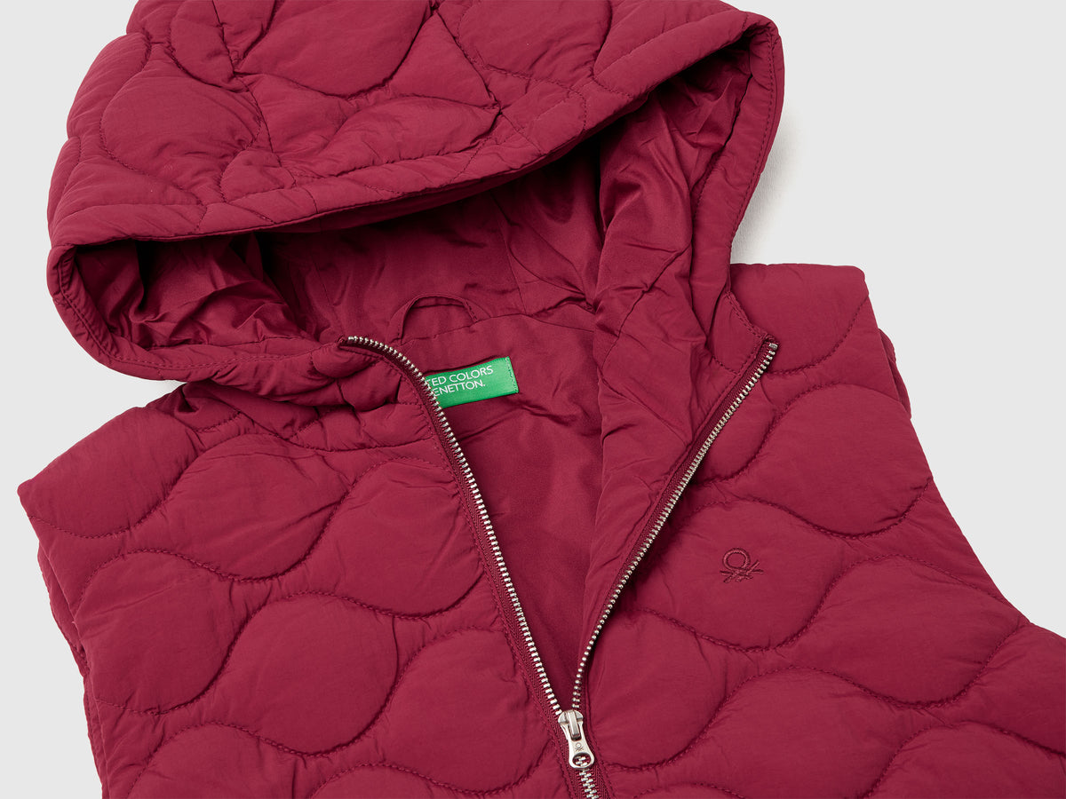 Gilet imbottito con cappuccio