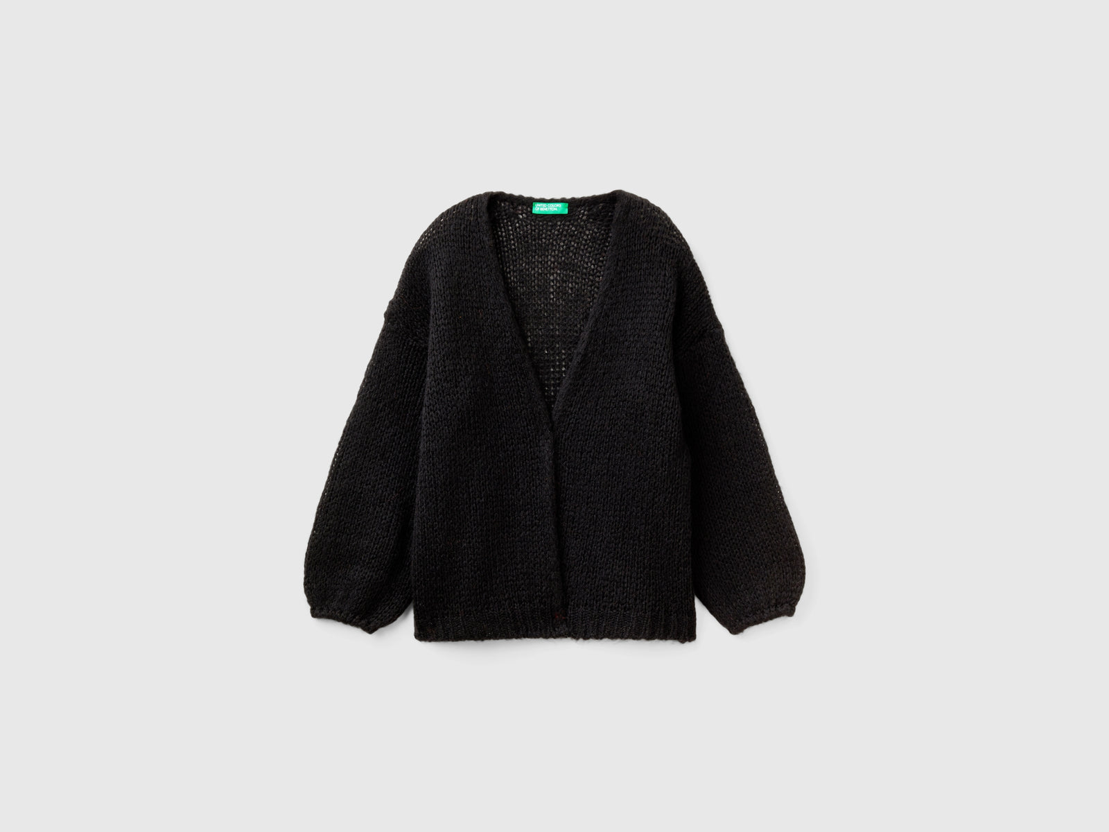 Cardigan over fit in misto lana da bambina nero | Benetton Outlet