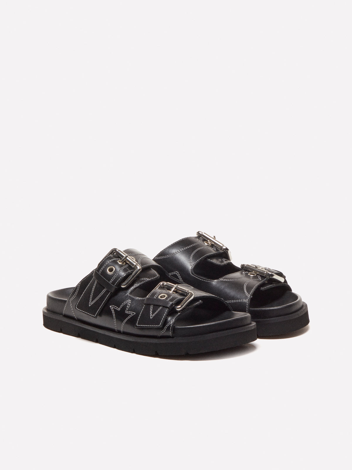 Ciabatte in pelle con impunture