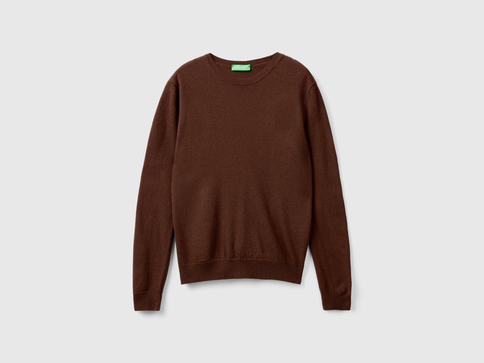Maglia girocollo scuro in pura lana Merino da donna marrone | Benetton Outlet