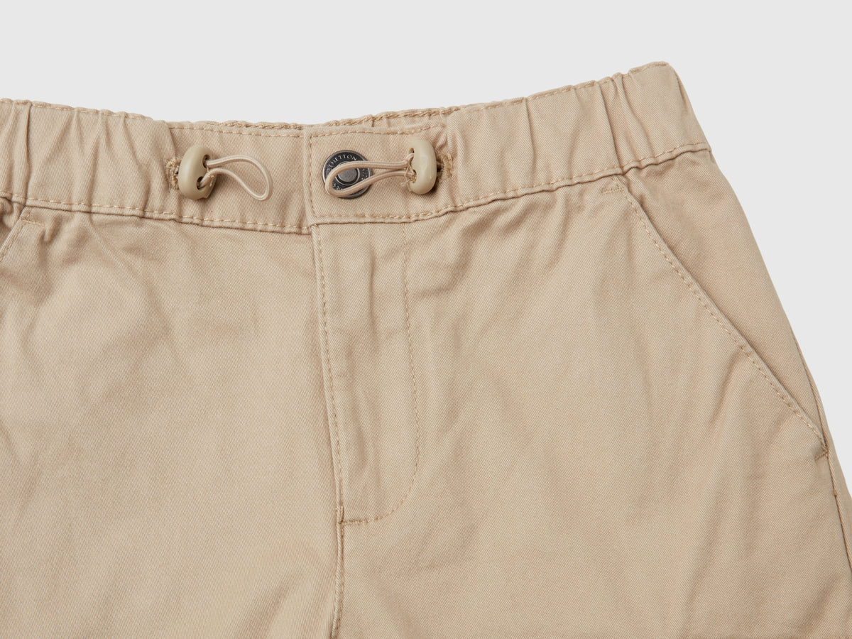 Pantaloni parachute in cotone stretch