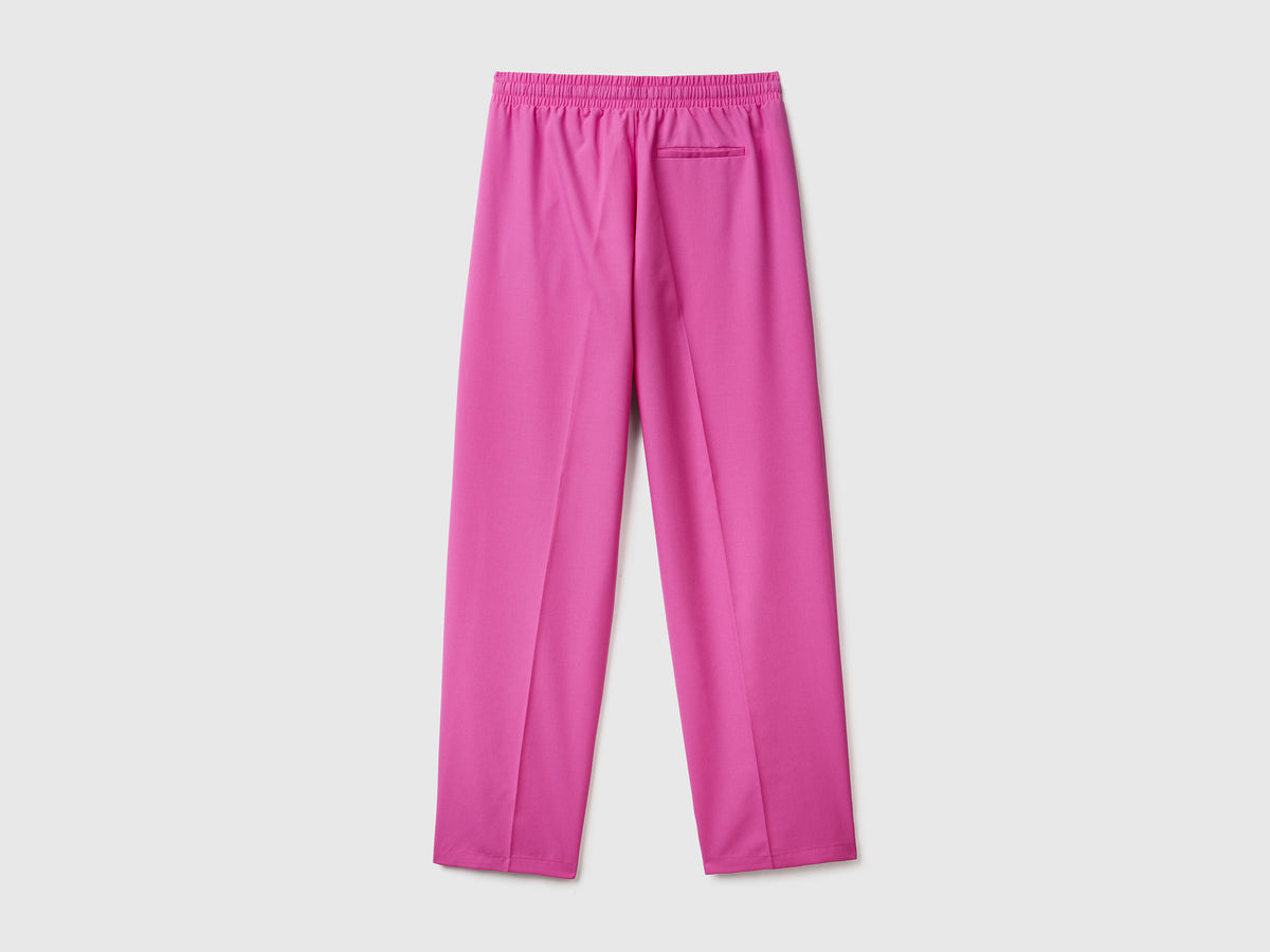 Pantaloni lunghi fluidi modello jogger in misto viscosa