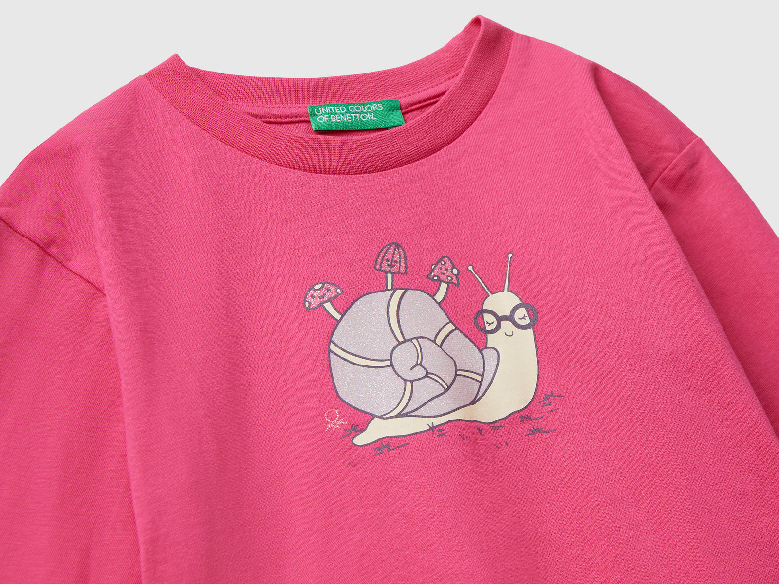 Maglietta in cotone con stampa glitter da bimba fucsia 3 | Benetton Outlet