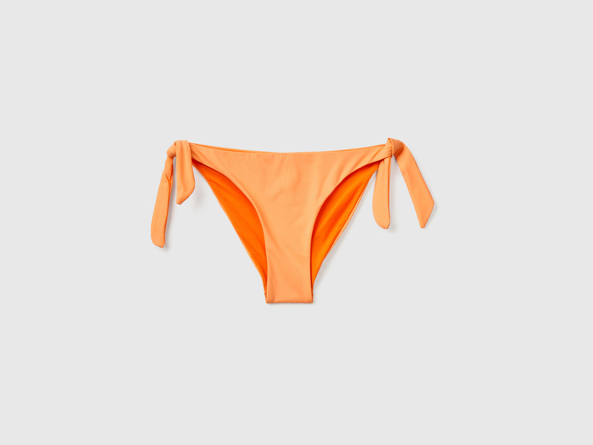 Slip costume con fiocchi laterali