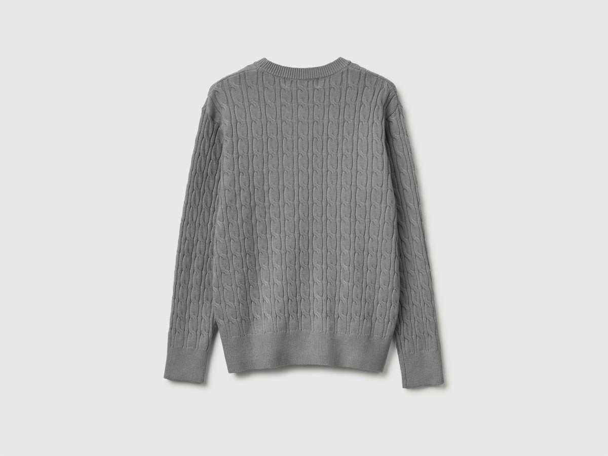 Maglione con trecce