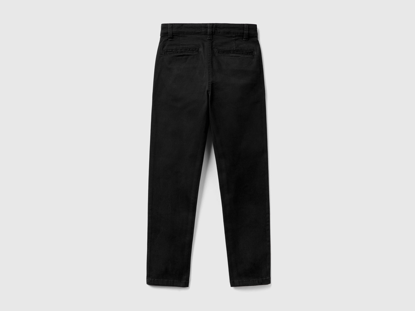 Slim fit chinos in stretch cotton da bambino nero 2 | Benetton Outlet