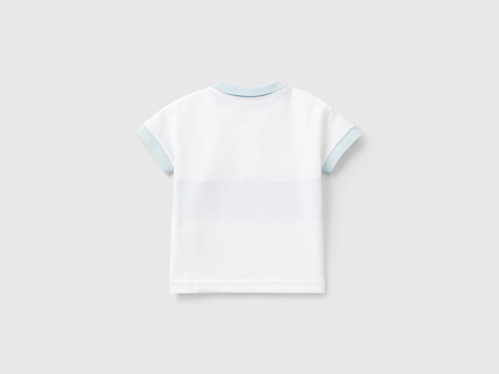 Polo in cotone bio da neonato bianco 2 | Benetton Outlet