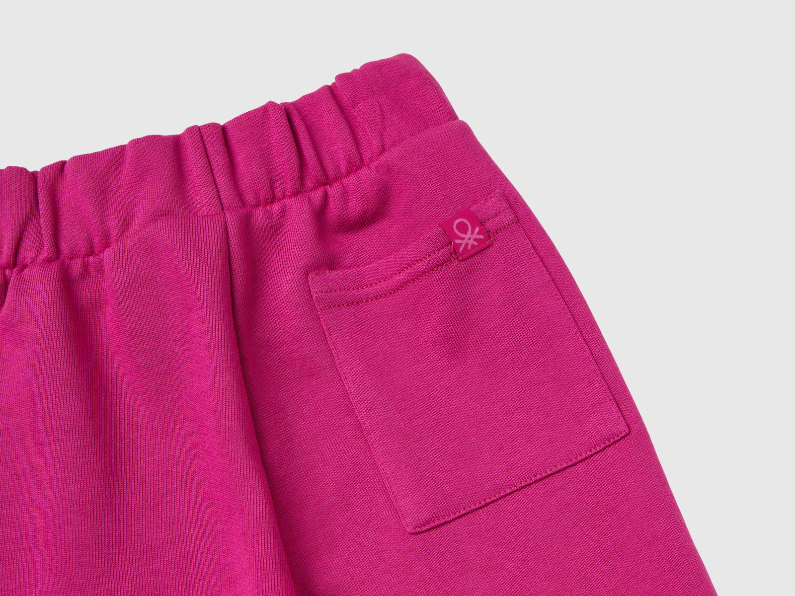Tuta in felpa con logo da bimbo fucsia 3 | Benetton Outlet