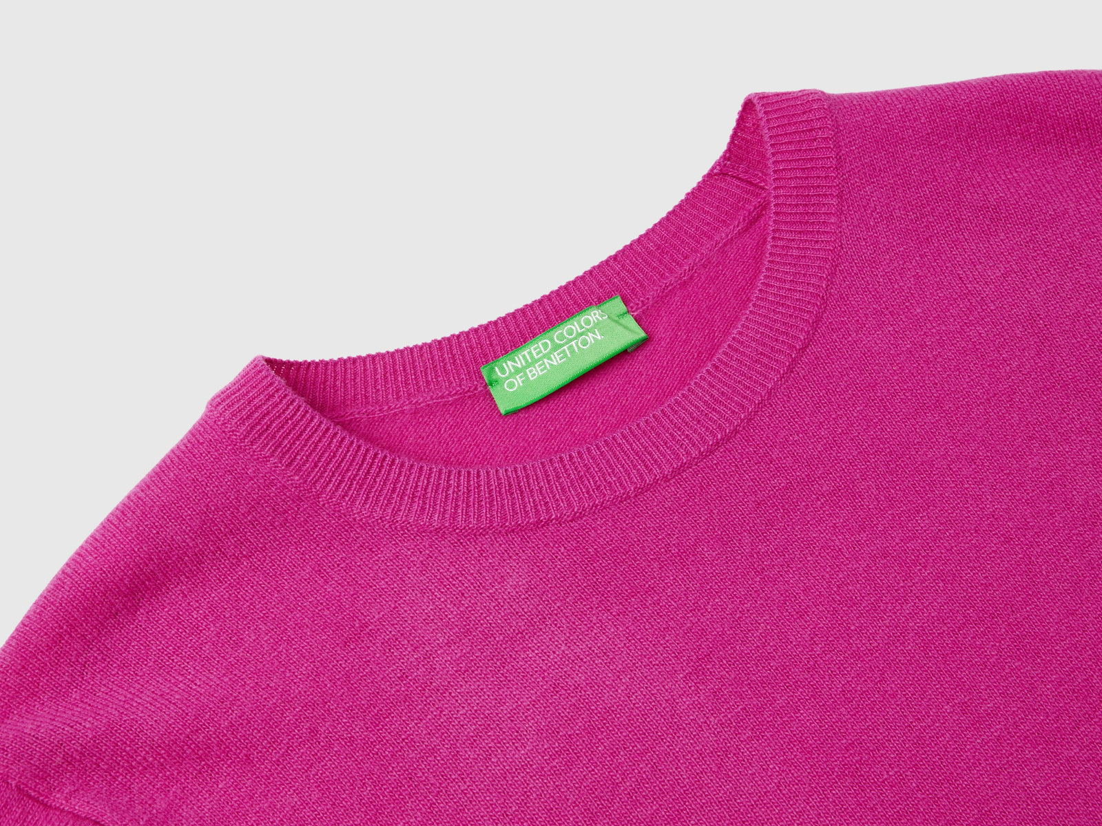 Fuchsia crew-neck sweater in pure Merino wool da donna ciclamino 3 | Benetton Outlet