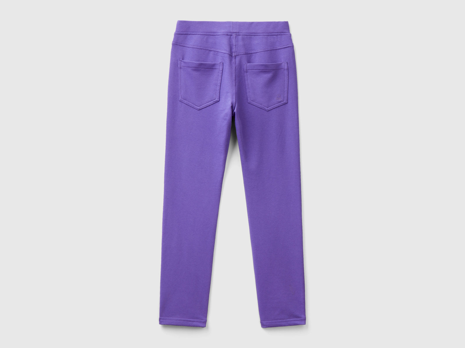 Jeggings in felpa stretch da bambina viola 2 | Benetton Outlet